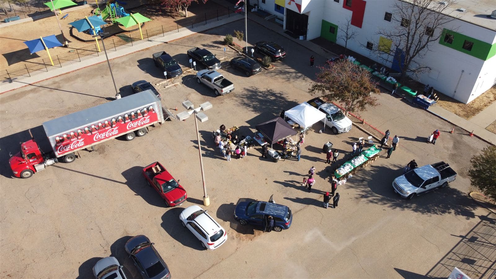 A closer overhead view of the 2025 tents and tables